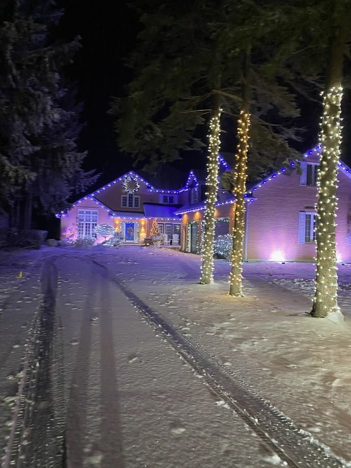 Classic Christmas Lighting team professionally installing Christmas lights on a residential home in Kitchener-Waterloo